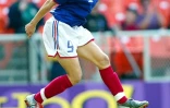 La Française Marinette Pichon exulte après avoir inscrit un but face au Brésil au Mondial, le 27 septembre 2003 à Washington