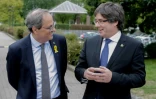 Quim Torra, président de la Catalogne (à gauche), et l'ancien président Carles Puigdemont (à droite), le 27 août 2018 à Bruxelles
