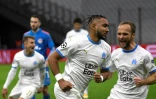 L'attaquant français Dimitri Payet, célèbre son but sur pénalty à côté de l'attaquant Valère Germain, lors du match de Ligue des Champions contre l'Olympiakos, le 1er décembre 2020 au stade Vélodrome
