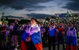 Des supporters russes dans la fan-zone de l'Euro à Moscou, le 12 juin 2021, pendant le match de leur équipe contre la Belgique