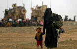 Des civils ayant fui l'ultime réduit du groupe Etat islamique (EI) dans l'est de la Syrie, le 13 février 2019