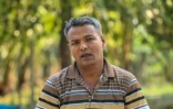 Abdul Goni Gazi, un sauveteur basé dans les Sundarbans, connu sous le nom de "Goni Tiger" et réputé pour son aide aux victimes d'attaques de tigres, lors d'un entretien avec l'AFP à Shyamnagar, dans le district de Satkhira, le 2 avril 2026 au Bangladesh