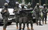 Des soldats sud-coréens participent à un exercice antiterroriste dans un hôtel àSéoul, le 19 août 2026, en marge d'un exercice militaire conjoint entre la Corée du Sud et les États-Unis baptisé "Ulchi Freedom Shield"