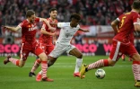 L'attaquant français du Bayern Munich, Kingsley Coman  (c), lors du match de Bundesliga à Cologne, le 16 février 2020 