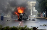 Un véhicule de police incendié par les manifestants à Managua le 2 septembre 2018