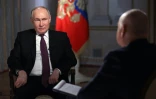 Le président russe Vladimir Poutine lors d'une interview avec le directeur de l'agence d'information russe RIA Novosti, au Kremlin, le 12 mars 2024 à Moscou