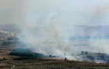 De la fumée s'élève d'une zone ciblée par des tirs israéliens dans la plaine de Marjeyoun, le long de la frontière sud du Liban, le 4 octobre 2024