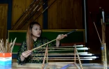 Une vendeuse de flèches, le 23 août 2018 à Thimphou, au Bhoutan