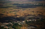 Vue aérienne prise depuis un hélicoptère de la sécurité civile montrant l'étendue des dégâts causés par un incendie sur la commune de Le Porge, en Gironde, le 31 juillet 2026
