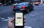 L'application Uber sur un smartphone le 25 mars 2015 à Washington