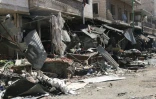Un marché détruit  à Maaret al-Noomane, dans la province syrienne d'Idleb, après des frappes le 19 avril 2016