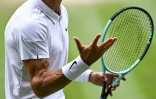 L'Italien Lorenzo Musetti contre Novak Djokovic en demi-finale de Wimbledon, le 12 juillet 2024 Ă Londres