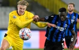L'attaquant de Dotmund Erling Braut Haaland (g) à la lutte avec le défenseur de Bruges Odilon Kossounou en Ligue des champions, le 4 novembre 2020 à Bruges