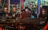 Des passagers dans un bus de Shanghaï, le 17 mars 2020