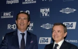 Patrick Drahi (g) et Alain Weill en octobre 2018 à Paris