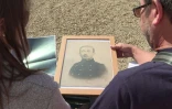 Emeline Léger regarde un portrait de son arrière-grand-père, qui avait combattu de 1914 à 1918, avant de mourir dans un asile d'aliénés.