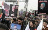Des partisans du Hachd al-Chaabi, coalition de factions irakiennes pro-Iran, manifestent dans les rues de Bagdad le 1er janvier 2022, pour commémorer le deuxième anniversaire de l'assassinat par les Etats-Unis du général irakien Qassem Soleimani et de son lieutenant irakien