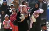 Des Palestiniens fuyant Rafah arrivent à Khan Younès, dans le sud de la bande de Gaza, le 31 mars 2025