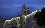 L'église de la Nativité à Bethléem illuminée pour Noël, le 23 décembre 2021