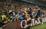 La joie des Parisiens après un but inscrit par Désiré Doué (au centre) contre l'Inter Milan à Munich, le 31 mai 2025 