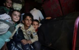 Des enfants syriens réfugiés au Liban retournent dans leur pays d'origine, à Qah, le 4 octobre 2024