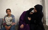 Une mère palestinienne pleure ses enfants tués lors de bombardements israéliens nocturnes à Rafah, dans le sud de la bande de Gaza, le 20 avril 2024