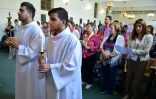 "A Lourdes, on peut mettre toutes nos souffrances ensemble, dans les mains de la Vierge", confie Bachar, un pélerin, à Lourdes, le 14 août 2018