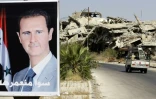 Un véhicule passe à côté d'une affiche de Bachar al-Assad et des bâtiment détruits du quartier Jouret al-Shiah à Homs le 19 septembre 2016