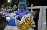Un supporter uruguayen célèbre la victoire de l'Uruguay sur l'Italie en finale de la Coupe du monde U20, à Montevideo, le 11 juin 2023