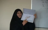 Batoul Mahadiyar, directrice d'une école coranique réservée au femmes, lors d'un exposé sur les méthodes contraceptives le 19 mars 2016 à Mazar-i-Sharif
