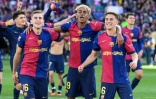 (de gauche à droite) Les joueurs du FC Barcelone Fermin Lopez, Lamine Yamal et Gavi célèbrent la victoire face au Real Madrid (4-3), lors de la 35e journée de Liga, à Barcelone, le 11 mai 2025