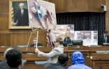 Présentation d'images de cadavres torturés par le régime syrien, devant un comité à Washington, le 31 juillet 2014