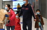 Une famille arrivée de Chine, à l'aéroport Charles-de-Gaulle près de Paris, le 26 janvier 2020