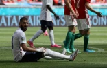 L'attaquant français Karim Benzema à terre lors du match de l'Euro contre la Hongrie le 19 juin 2021 à Budapest