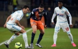 Ryad Boudebouz (c) entre Javier Manquillo et Georges-Kevin Nkoudou, lors du match entre Montpellier et Marseille, le 2 février 2016