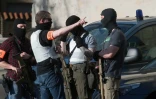 Des policiers des forces spéciales déployés à Münster (nord-ouest de l'Allemagne), le 7 avril 2018 après qu'une voiture a foncé dans la foule