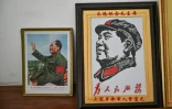 Des portraits de Mao Zedong dans un musée à Dazhai, dans la province du Shanxi, le 19 août 2026 dans le nord de la Chine
