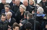 Marine Le Pen suivie de son garde du corps Thierry Légier   le 13 février 2017 à Menton