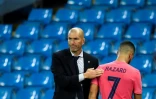 L'entraîneur du Real Zinedine Zidane et le joueur belge Eden Hazard, à Manchester (Angleterre) le 7 août 2020