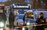 Un bus marqué "Evacuation" escorté par la police à Halle (Allemagne) le 9 octobre 2019