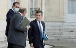 Le ministre de la Justice Eric Dupond-Moretti (de dos) avec le ministre de l'Intérieur Gérald Darmanin (C) et Le ministre des Outre-mer, Sébastien Lecornu, le 3 novembre 2021 dans la cour du palais de l'Elysée