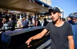 Des Irakiens participent aux funérailles à Najaf en Irak d'un manifestant tué à Bagdad, le 10 novembre 2019 