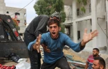 Un Palestinien réagit après la mort de Palestiniens dans une frappe israélienne, le 23 juin 2025 à Gaza-ville