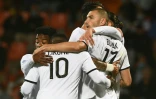 La joie de l'attaquant turc de Lille, Burak Yilmaz, après avoir égalisé sur pénalty (1-1) contre Lorient, lors de la 5e journée de Ligue 1, le 10 septembre 2021 au Stade du Moustoir