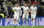 La joie de Cristiano Ronaldo (g) et ses coéquipiers du Real Madrid Karim Benzema (c) et Pepe, après un but du Portugais contre Wolfsburg, le 12 avril 2016 à Bernabeu