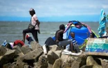 Des migrants haïtiens bloqués à la frontière avec le Panama, le 23 septembre 2021 à Necocli, en Colombie