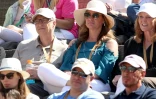 Bill Gates (en haut, à gauche) et Melinda Gates assistent à un match de tennis à Indian Wells, en Californie, le 15 mars 2019