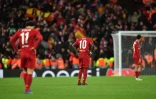 Les attaquants de Liverpool Sadio Mané (centre) et Mohamed Salah pendant le match contre l'Atletico Madrid à Liverpool le 11 mars 2020