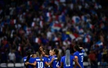 Des joueuses de l'équipe de France féminine de football célèbrent un but contre la Colombie lors du tournoi olympique, le 25 juillet 2024 à Lyon