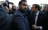 Alexandre Benalla (c) à côté d'Emmanuel Macron (d), le 24 février 2018 à Paris.